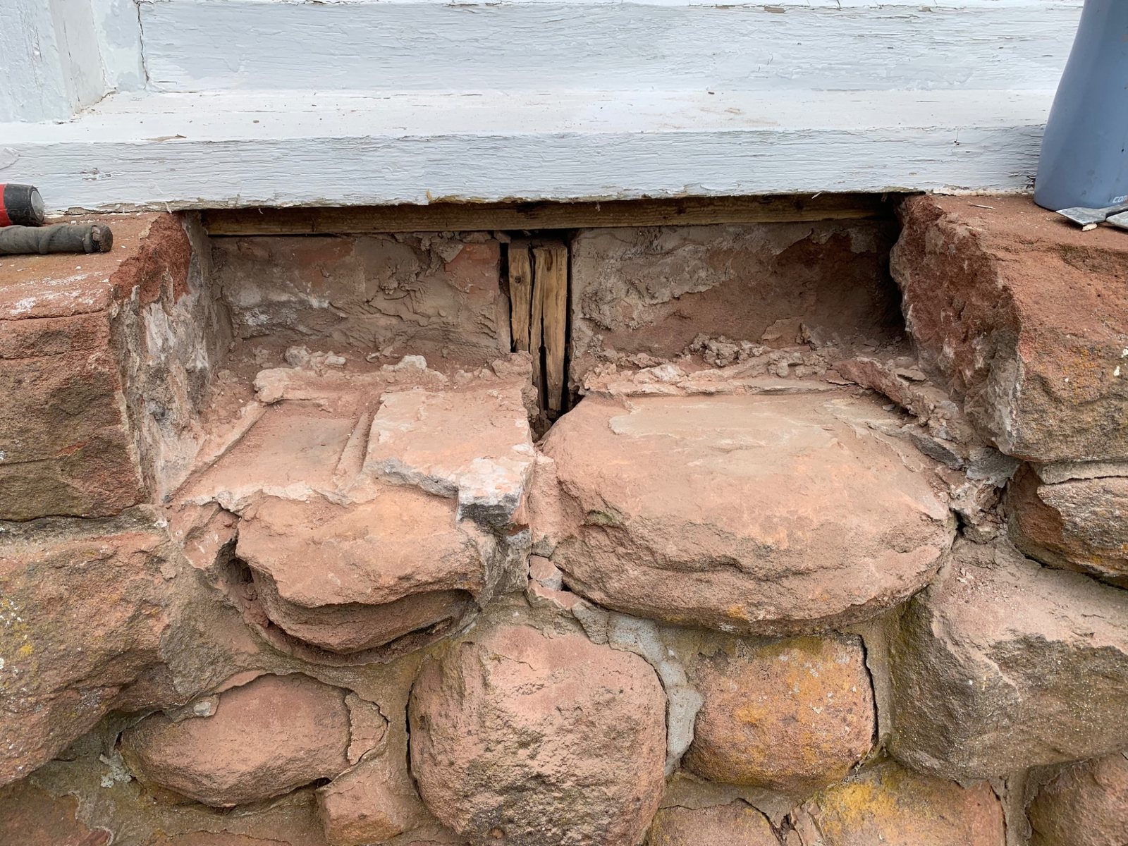 Historic stone window sill opened during repair at Dalvay by the Sea